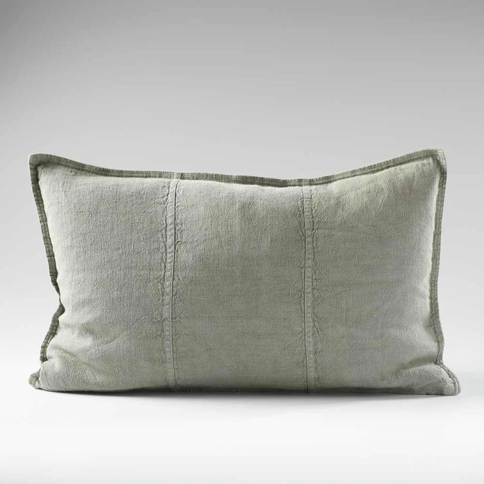 Green cushion on a white background