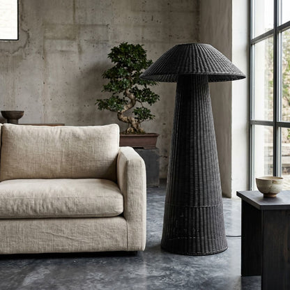 Malawi Cane Floor Lamp in Black in a living room setting