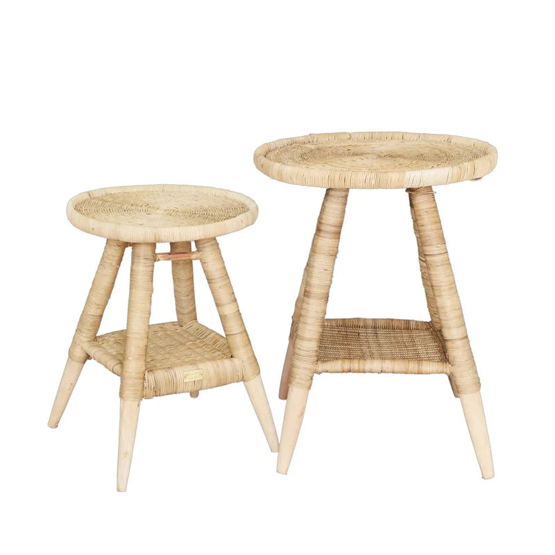 Two woven side tables on a white background
