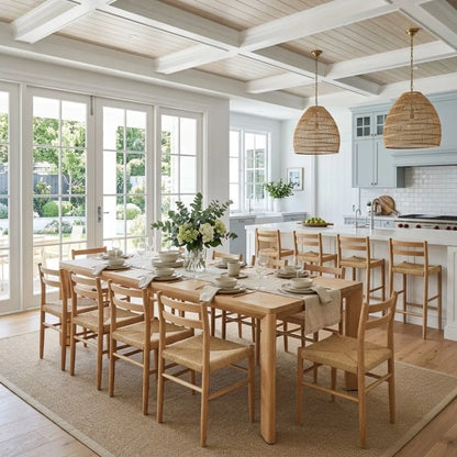 Dining room with wooden table and chairs in a bright kitchen.