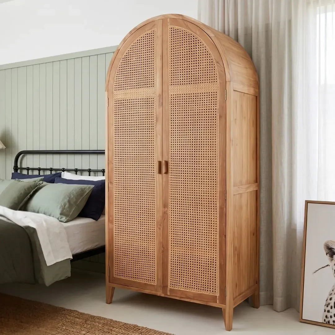 Wooden wardrobe with wicker design in a bedroom setting