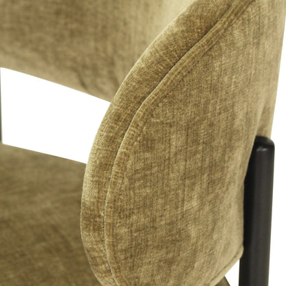 Ivy Olive green velvet upholstered dining chair with black metal legs on a white background