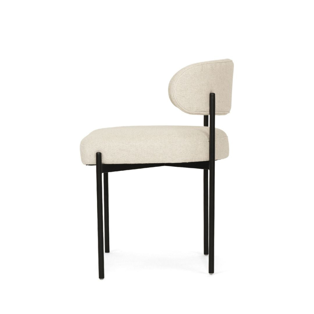 Beige chair with black legs on a white background
