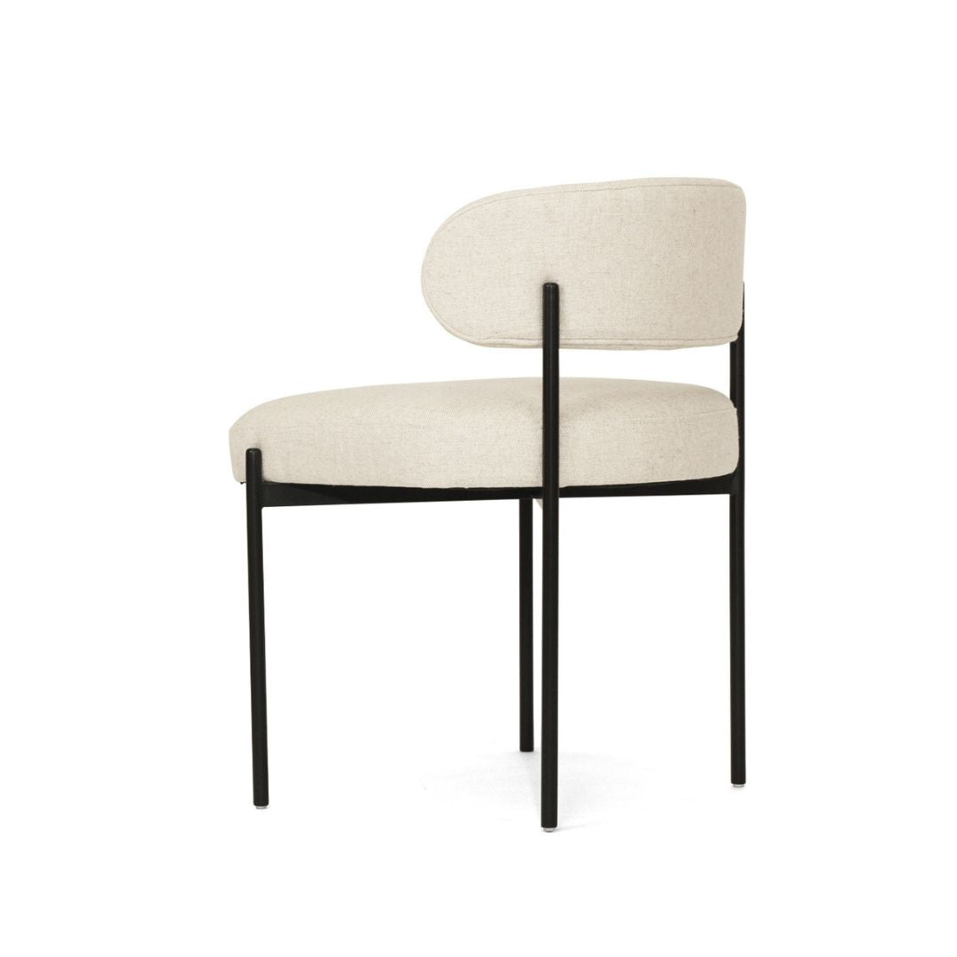 Beige chair with black metal frame on a white background