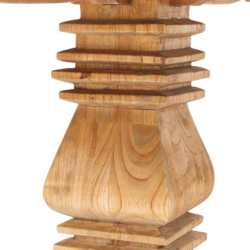 Wooden pedestal table on a white background