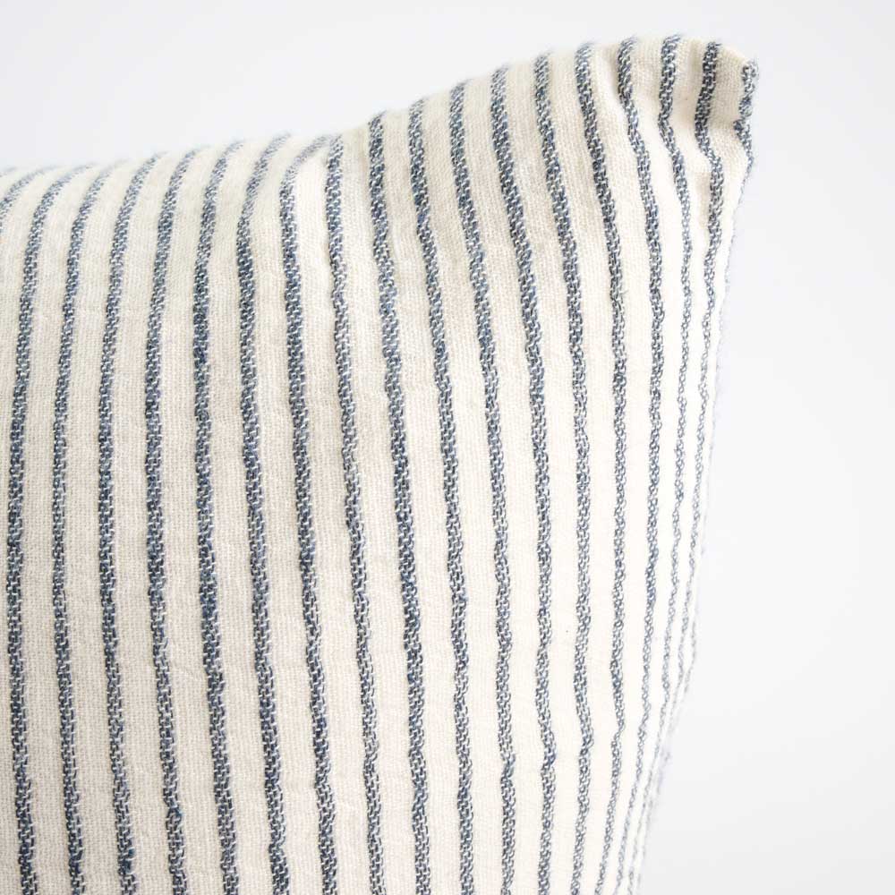 Close-up of a striped fabric with blue and white pin stripe