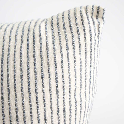 Close-up of a striped fabric with blue and white pin stripe