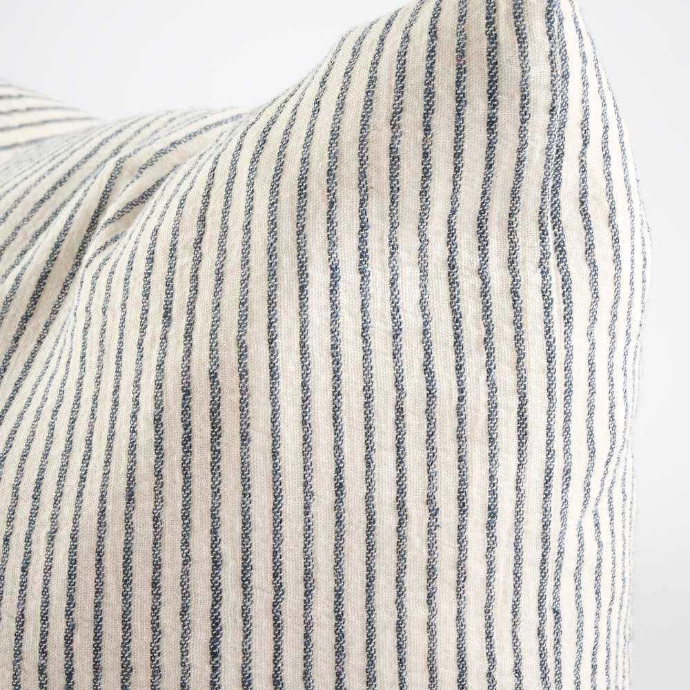 Close-up of a striped fabric with blue and white pin stripe