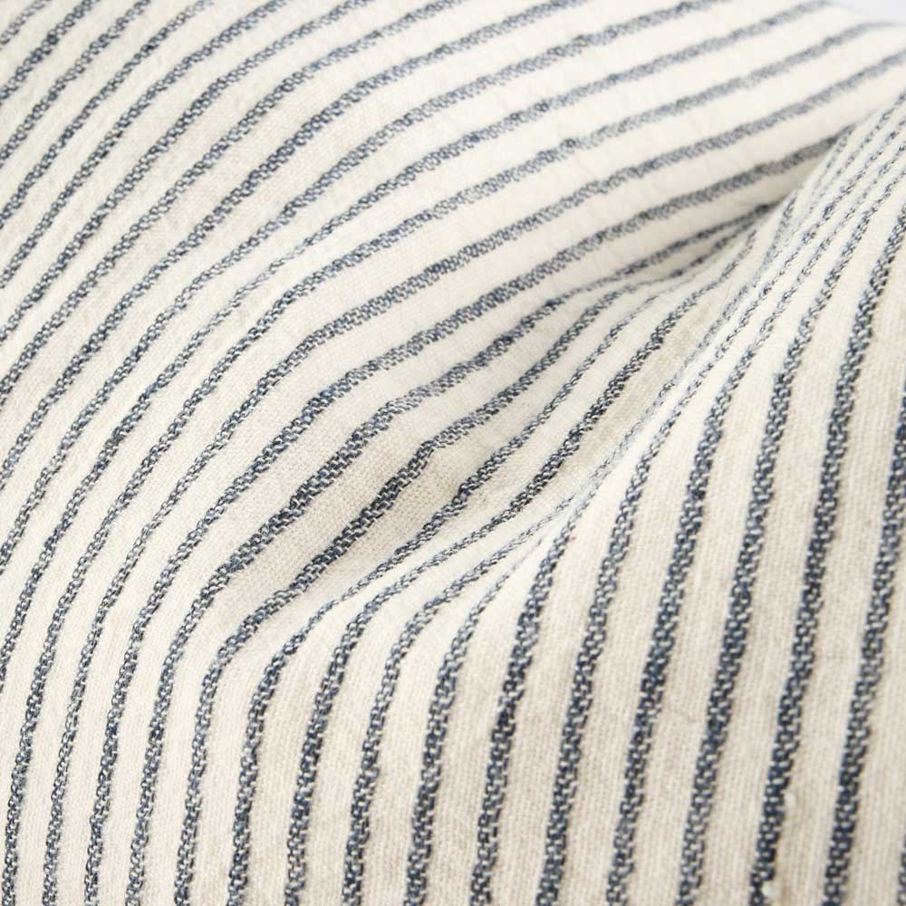 Close-up of a striped fabric with blue and white pin stripe