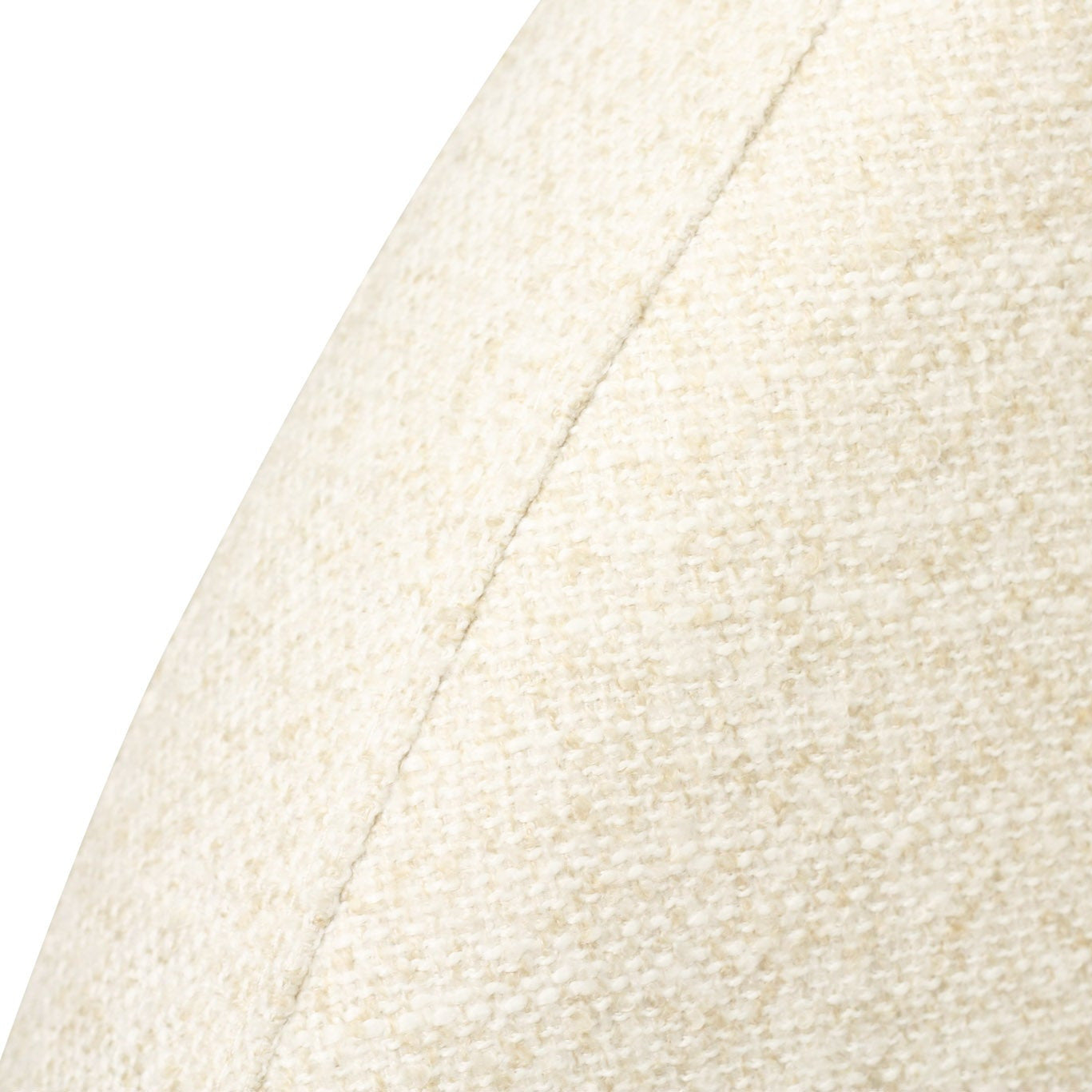 Close-up of a cream-colored woven fabric with a visible seam, showing the texture and color detail.