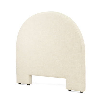 An upholstered headboard with a rounded top and a rectangular cutout at the bottom, covered in a textured cream fabric, shown on a plain white background.