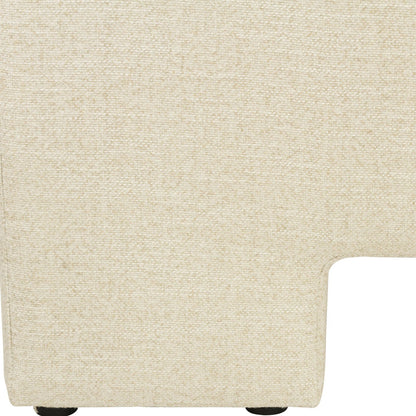 Close-up of a light beige textured fabric upholstery, showing the weave pattern and a corner detail with small dark feet visible at the bottom.