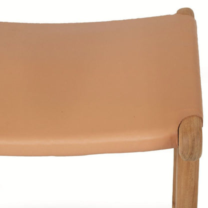 Close-up of a brown natural leather tan counter stool on a white background