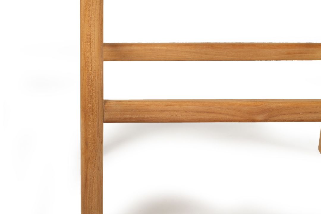 Close-up of a wooden counter stool with a white background