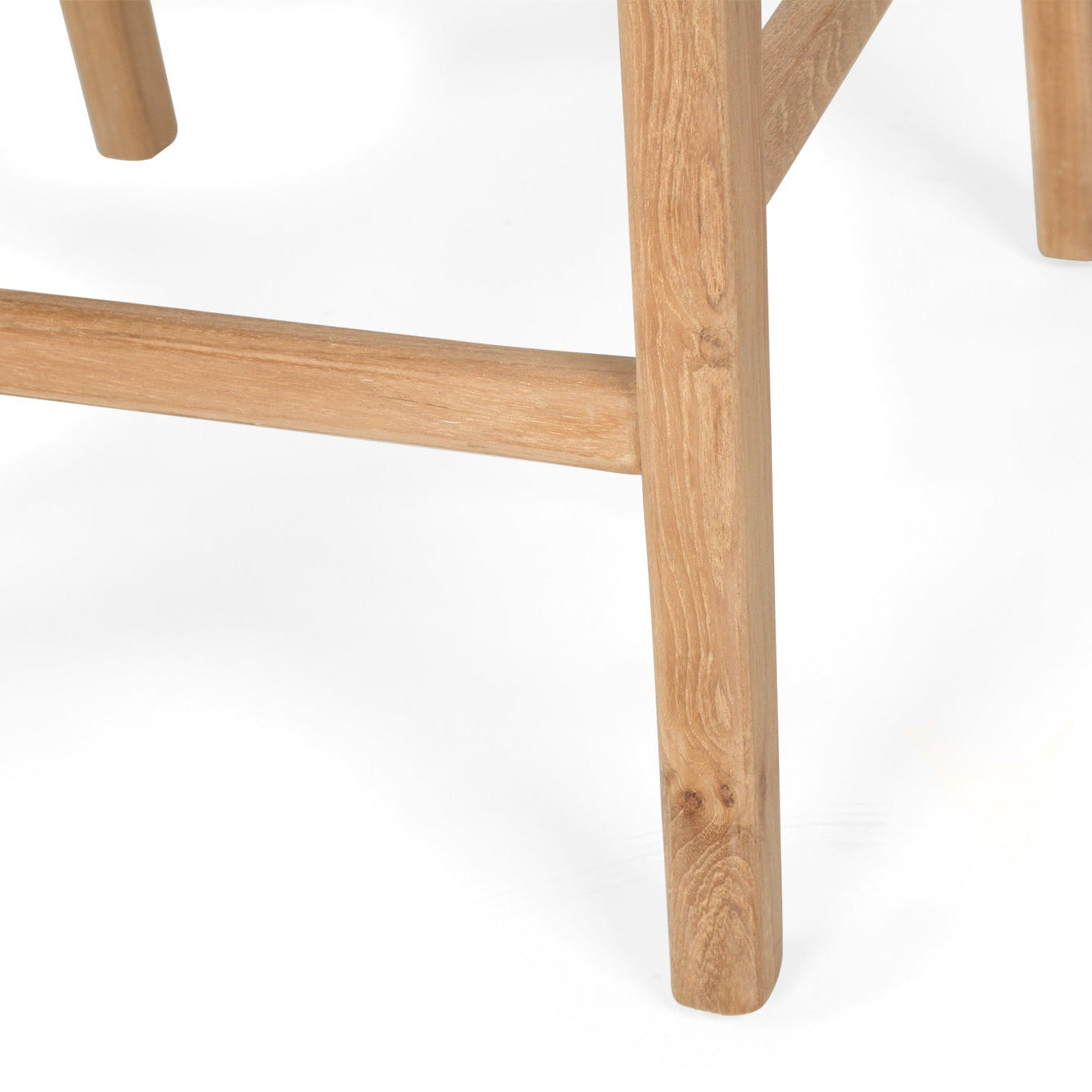 Close-up of a otis teak stool leg on a white background