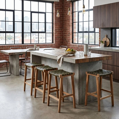 Modern industrial kitchen with island bench and olive leather stools