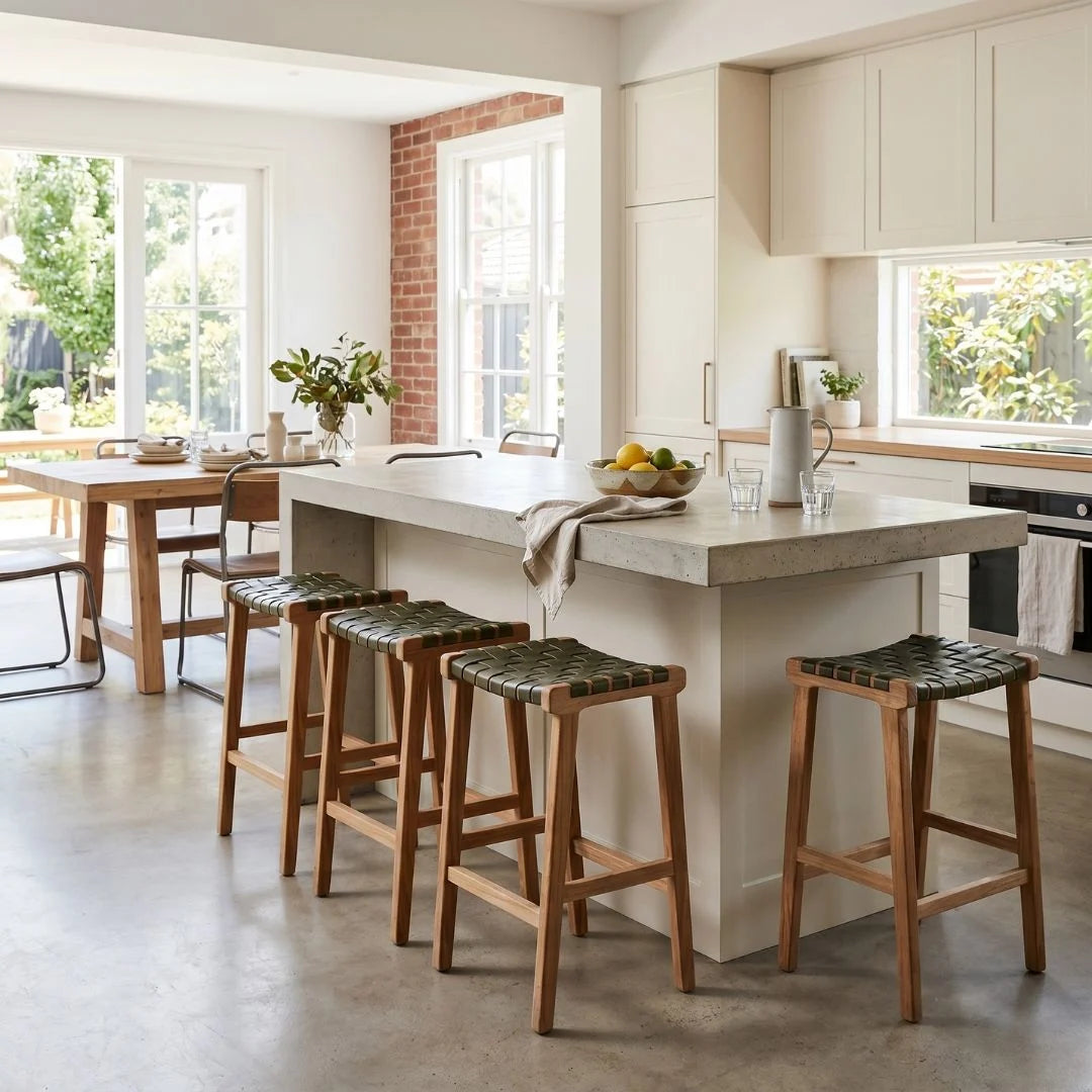 Modern kitchen with island bench and olive leather stools