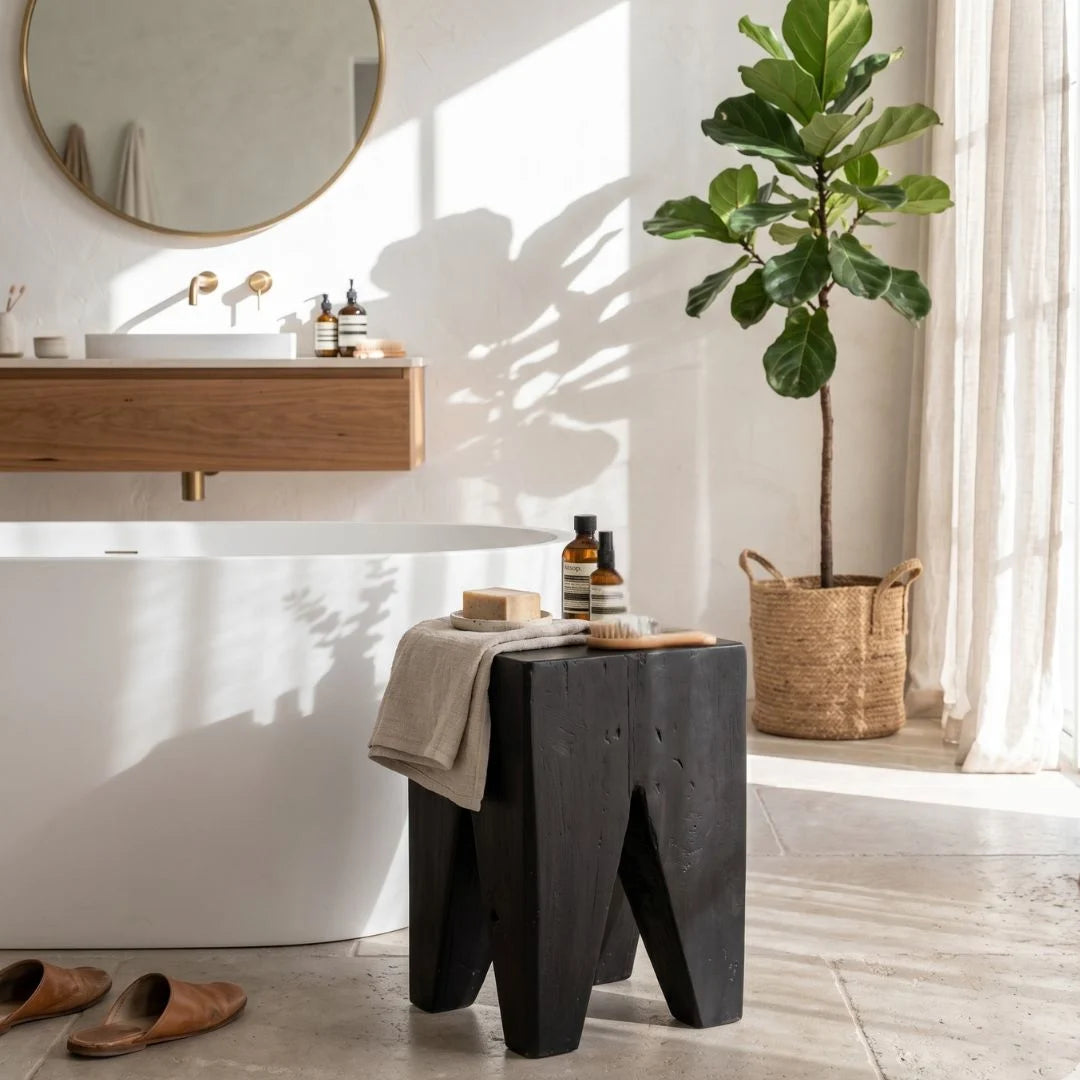 Black Teak square peg stump stool in a modern bathroom