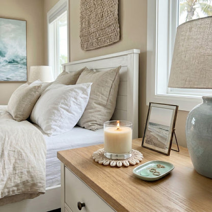 Cozy bedroom with a bed, nightstand, and decorative items.