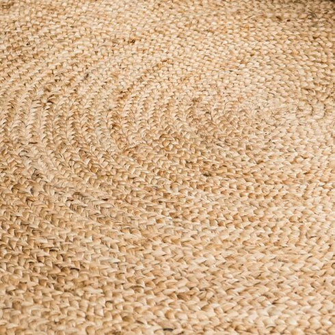 Close-up of a braided natural jute rug