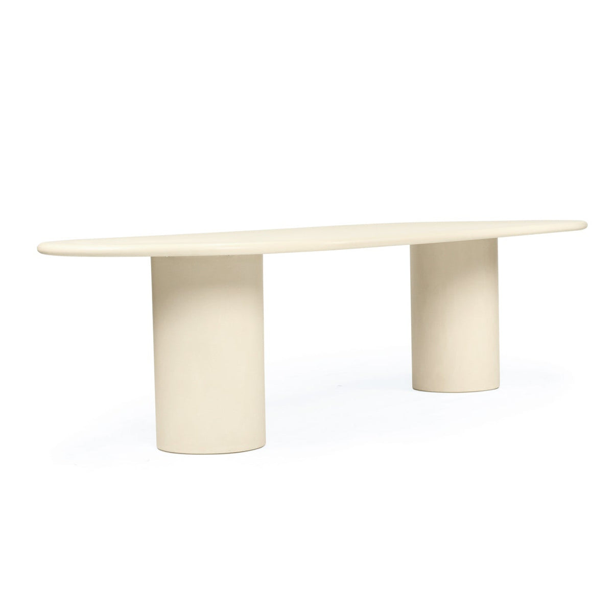 A minimalist modern table with a long oval top and two cylindrical pedestal legs, finished in a warm cream or off-white color, shown on a seamless white background.
