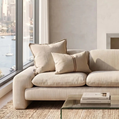 Orion Natural cushion on modern sofa