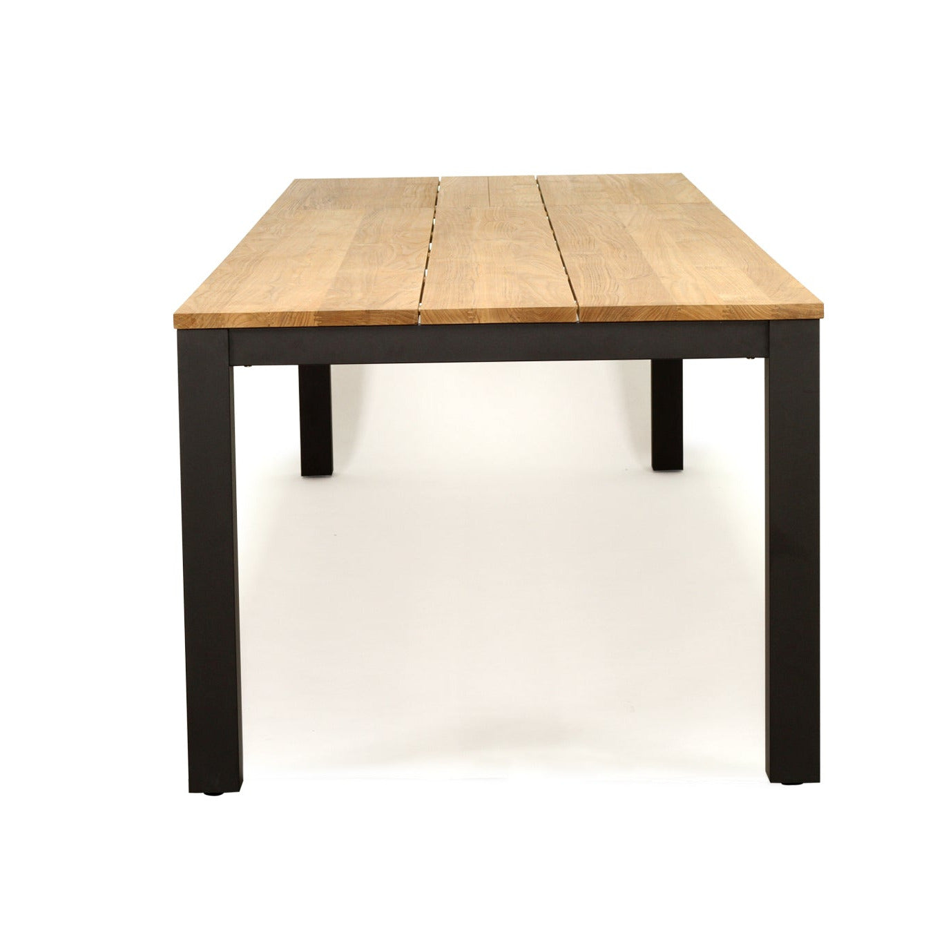 A rectangular outdoor dining table with a light natural wood plank top and a black metal frame, shown from a front three-quarter angle on a white background.