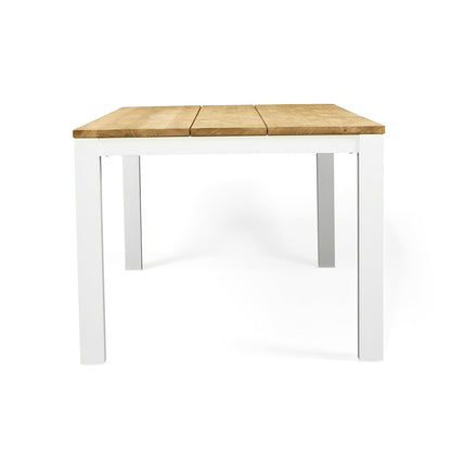 A modern rectangular table with a light natural wood top and a white frame, shown from a front angle on a white background.