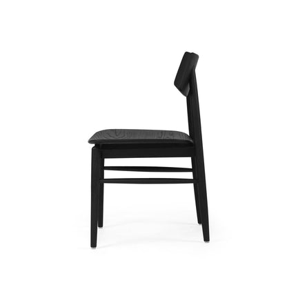 A modern black dining chair with a high backrest and a textured seat cushion, shown from a side profile against a solid white background.