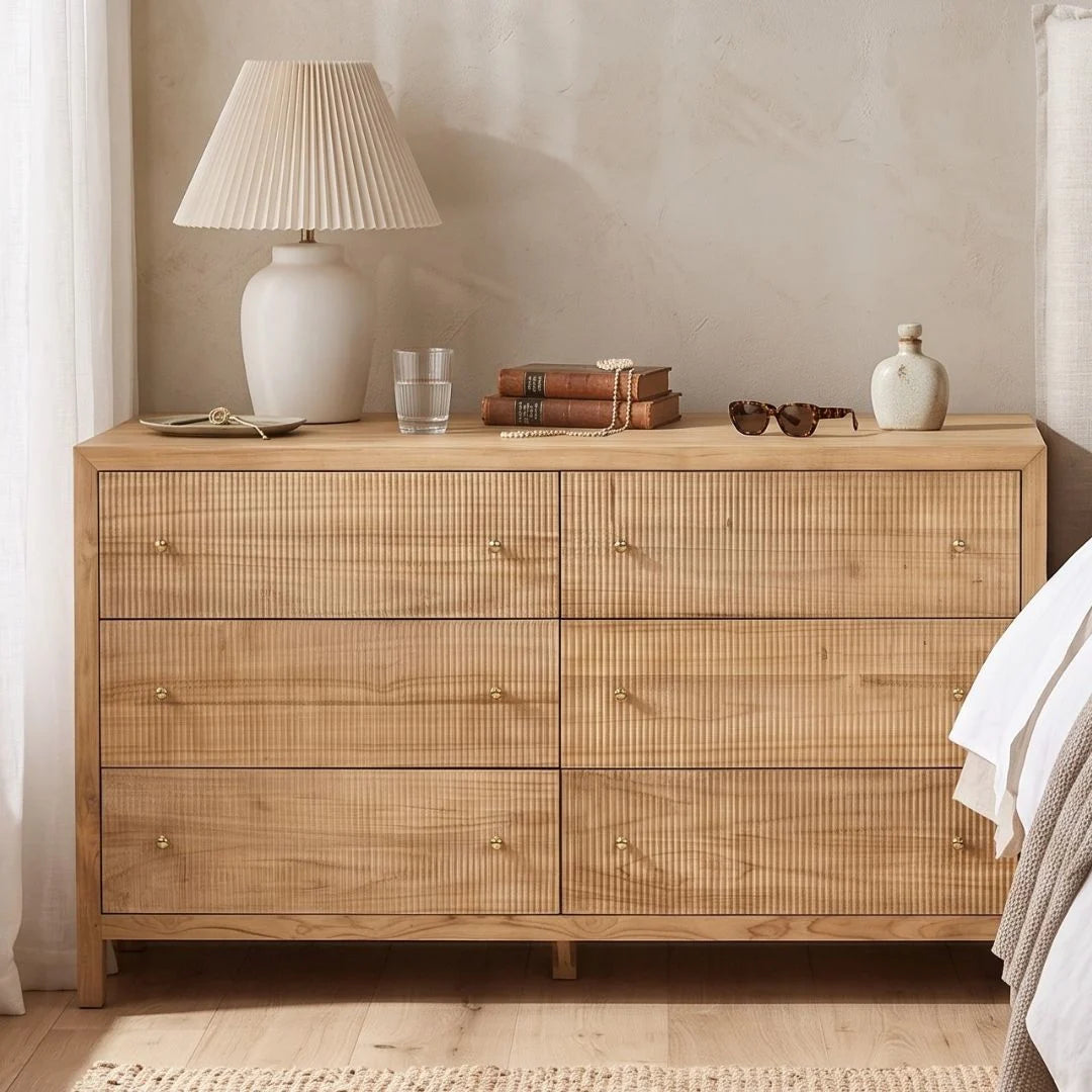 Sun Republic Kingscliff natural teak chest of drawers styled in a modern bedroom setting