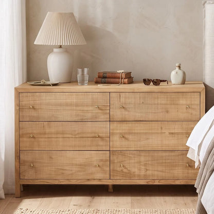 Sun Republic Kingscliff natural teak chest of drawers styled in a modern bedroom setting