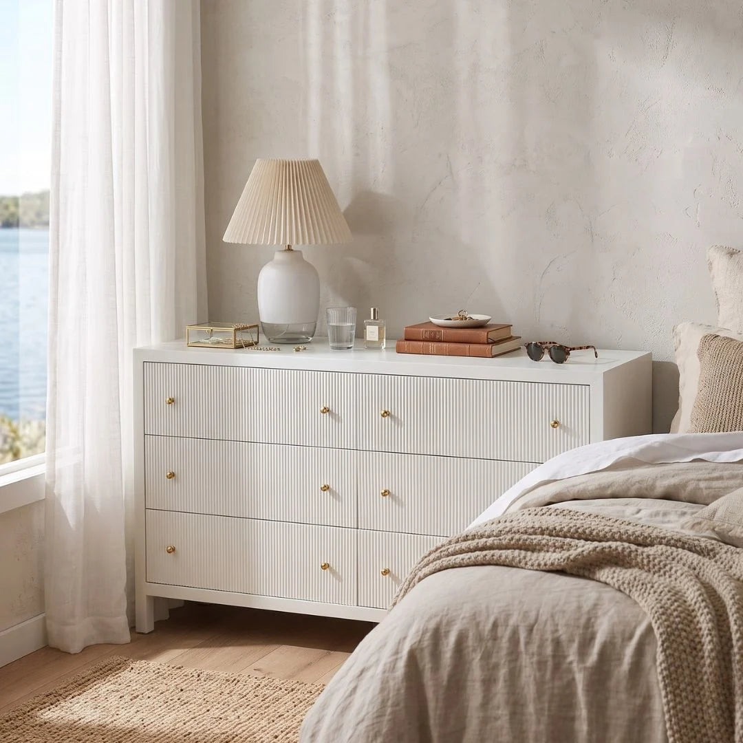 Sun Republic white chest of drawers in a styled modern bedroom setting