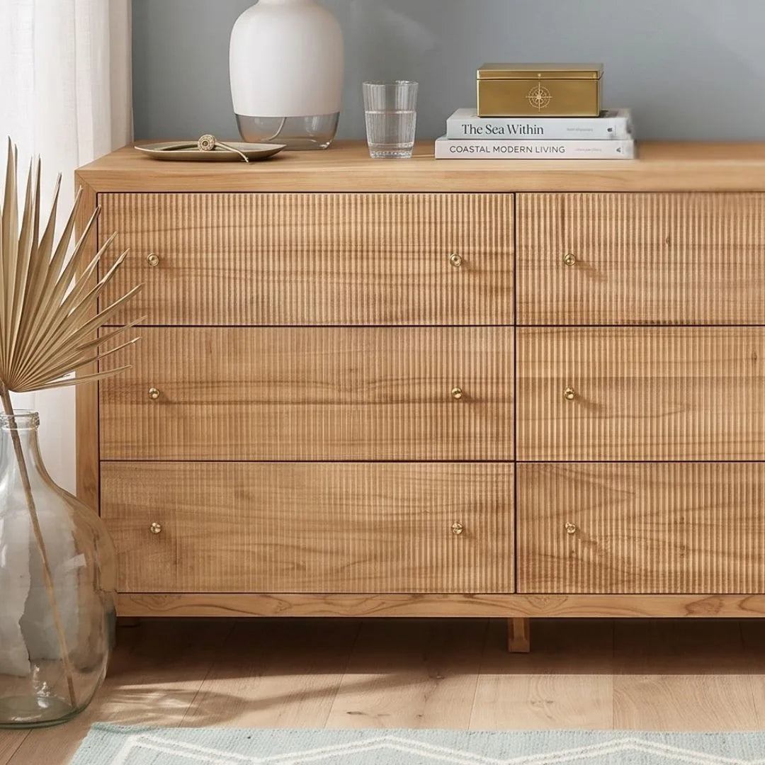Sun Republic Kingscliff natural teak chest of drawers styled in a modern bedroom setting