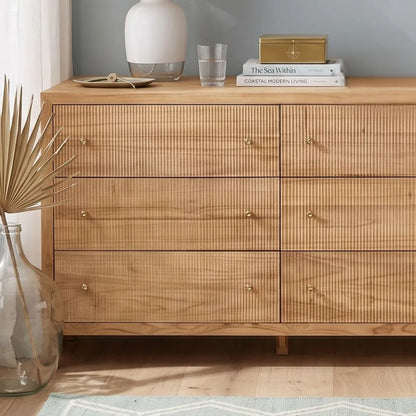 Sun Republic Kingscliff natural teak chest of drawers styled in a modern bedroom setting
