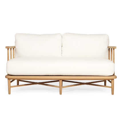 White sofa with wooden frame on a white background