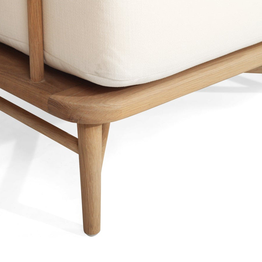 Wooden frame with white cushion on a white background