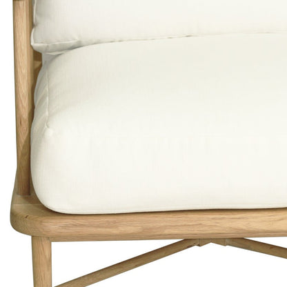 Wooden frame with white cushion on a white background