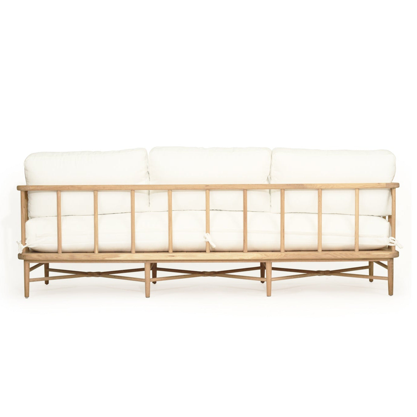 Wooden sofa with white cushions on a white background