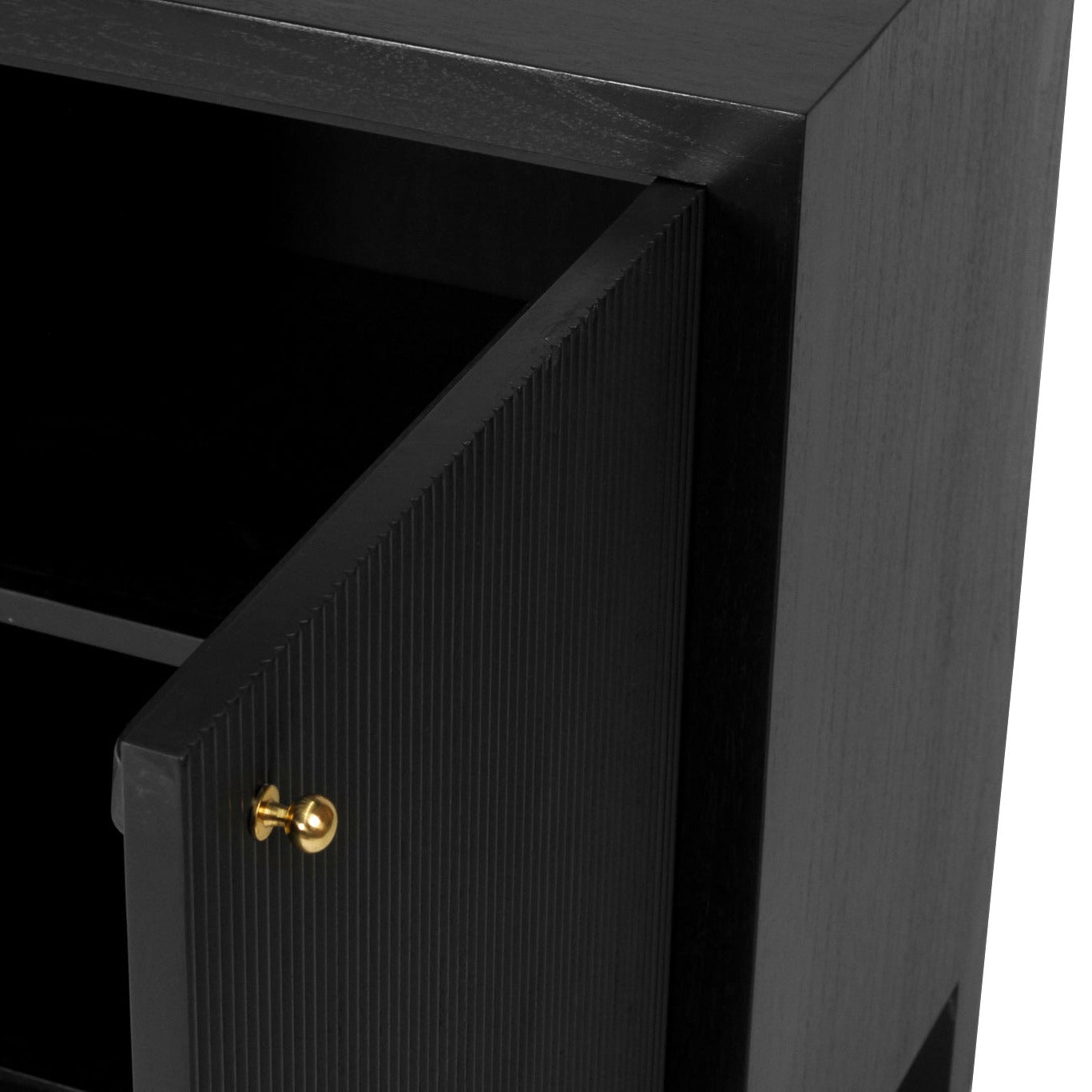 Black cabinet with a gold handle on a white background
