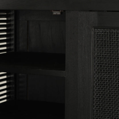 Close-up of the interior of a black storage cabinet, showing a slotted shelf, mesh panel on the right side.