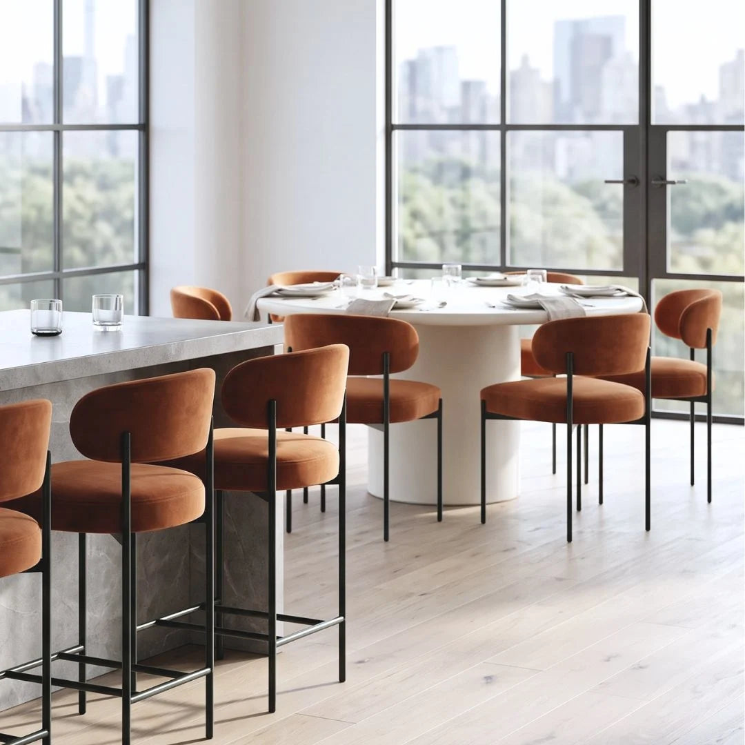 Modern dining area with high chairs and a large window view