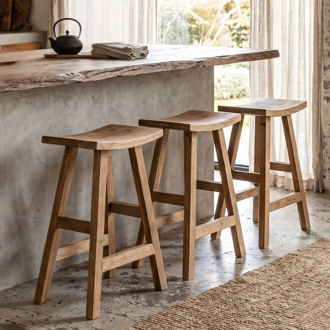 Sun Republic rustic teak counter stool in a row at a kitchen island bench in a modern farmhouse style kitchen
