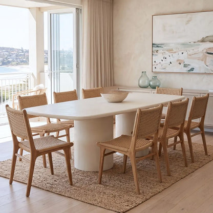 Sun Republic Siena microcement dining table 270cm styled with dining chairs in a modern dining room