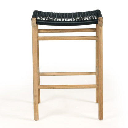 Bar stool with woven seat on a white background