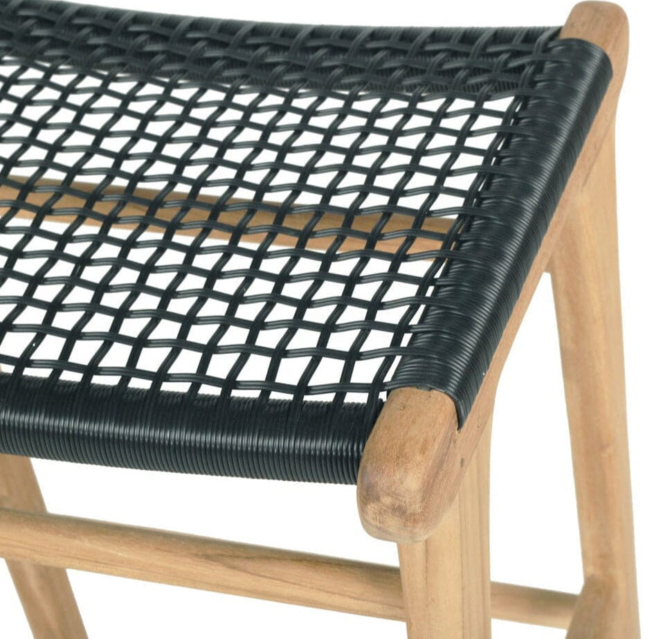 Close-up of a stool with black woven seat and wooden frame on a white background