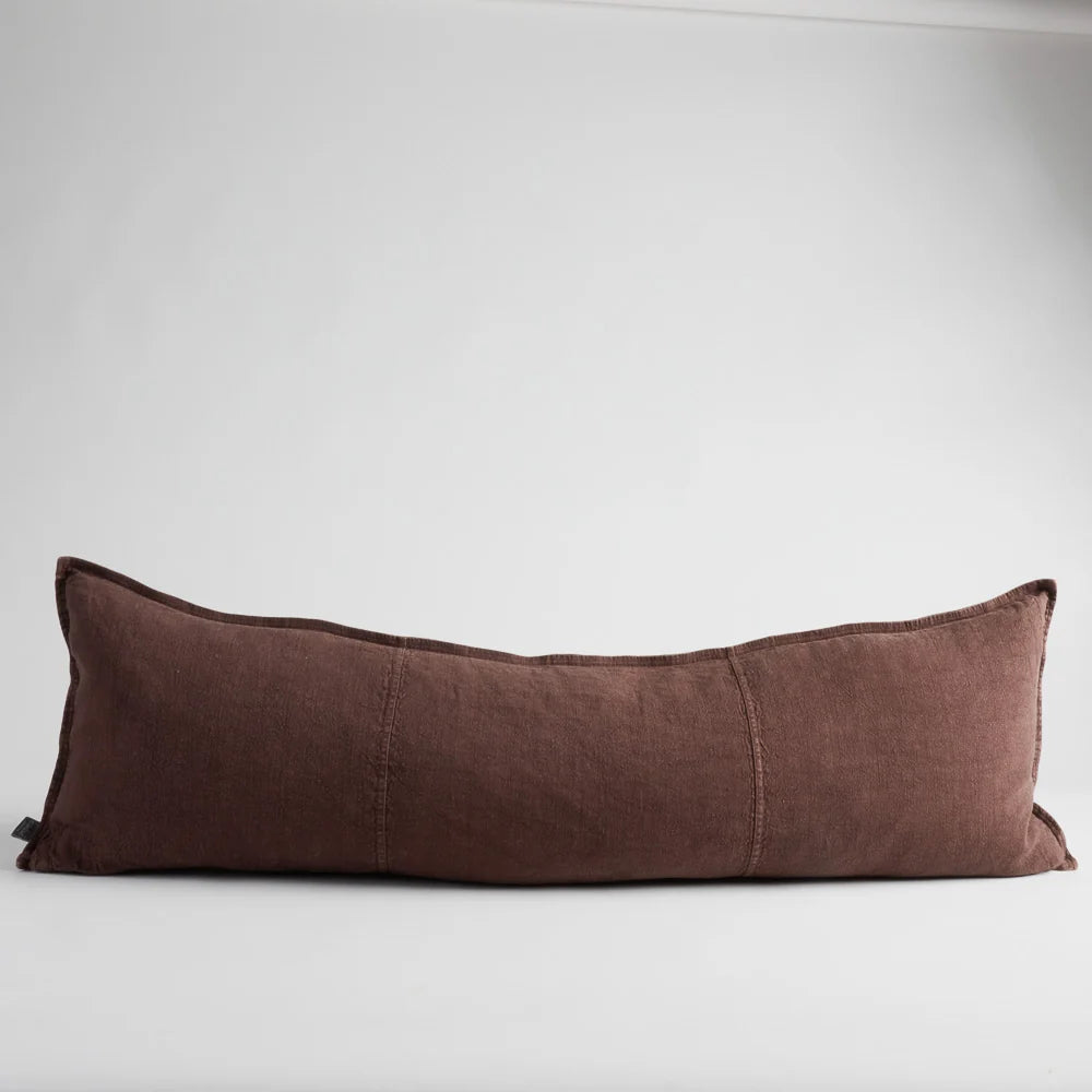 A long, rectangular lumbar pillow in a textured brown fabric, shown against a plain light gray background.
