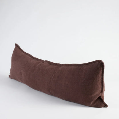 A long, rectangular lumbar pillow in a dark brown linen fabric, photographed on a clean white studio background.