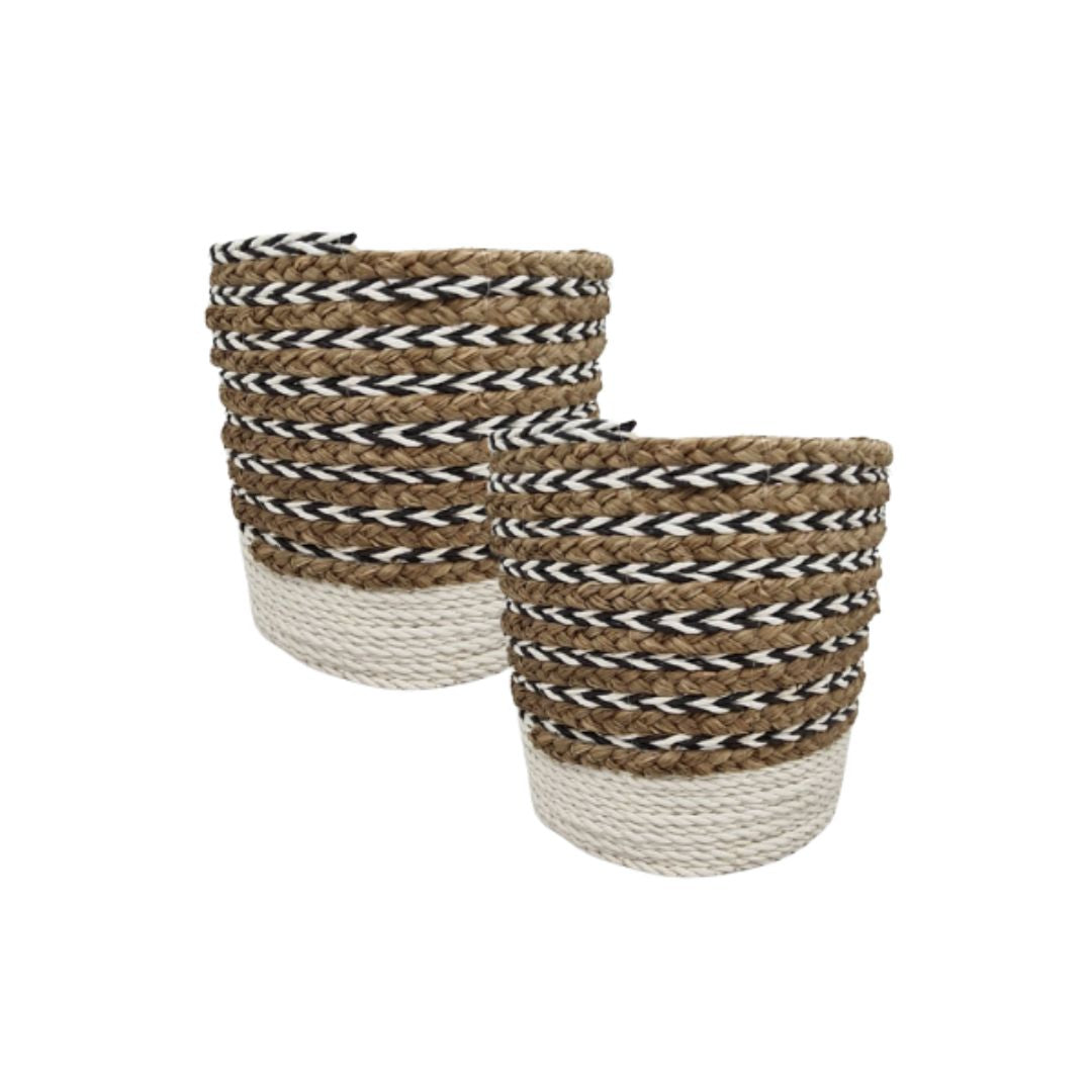 Two woven rope storage baskets with a natural brown body, black and white braided stripes, and cream-colored bases, shown on a plain white background.