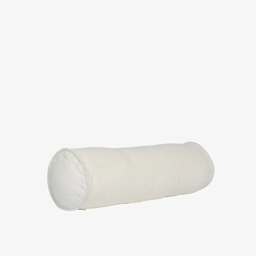 A cylindrical bolster pillow in a soft off-white fabric, shown horizontally against a plain white background.