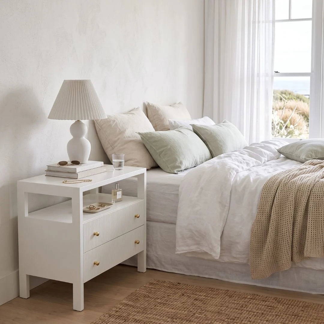 Sun Republic White Kingscliff bedside table in a styled modern bedroom